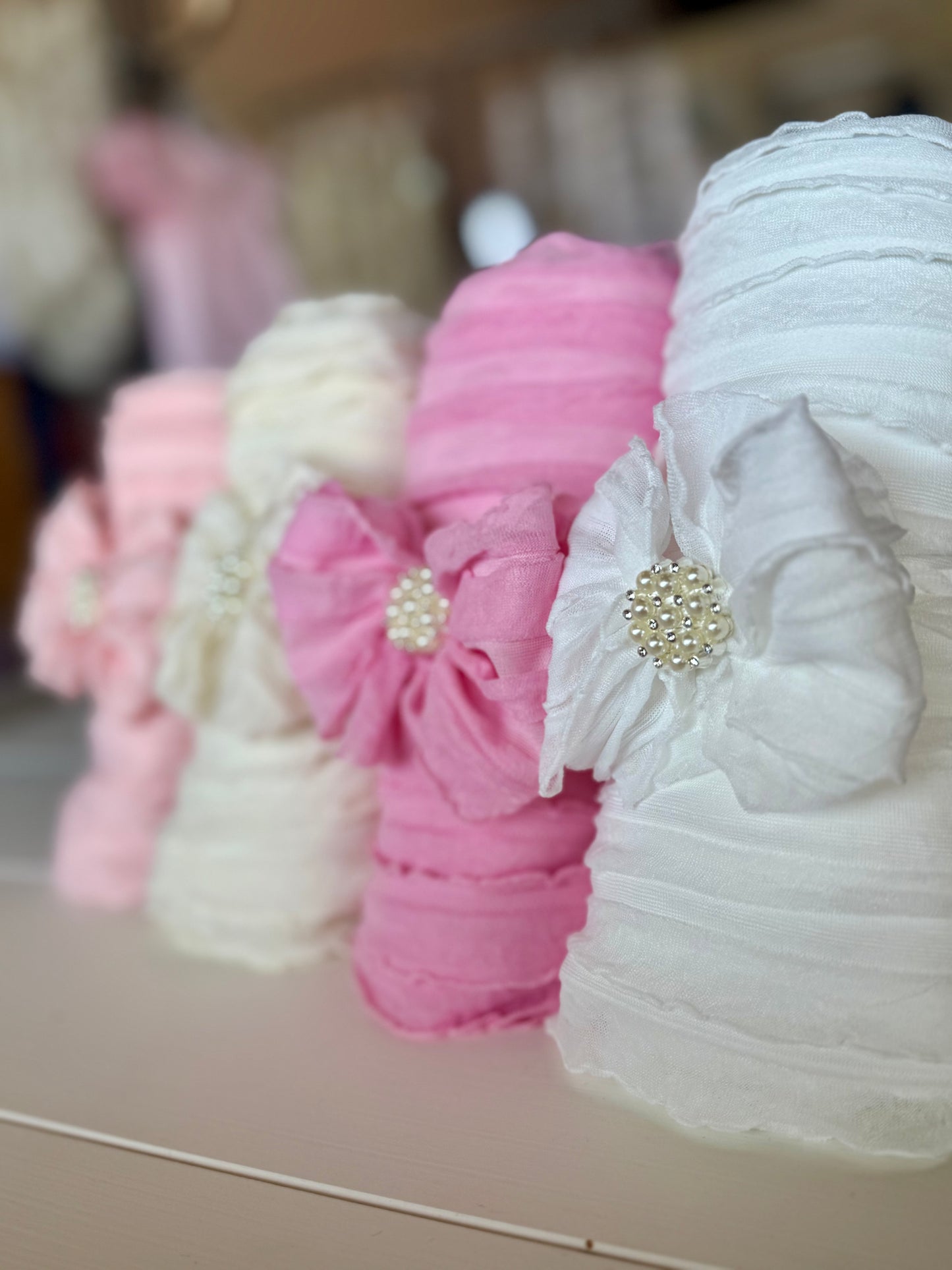 Ruffled Swaddle and Pearl
Headband Set